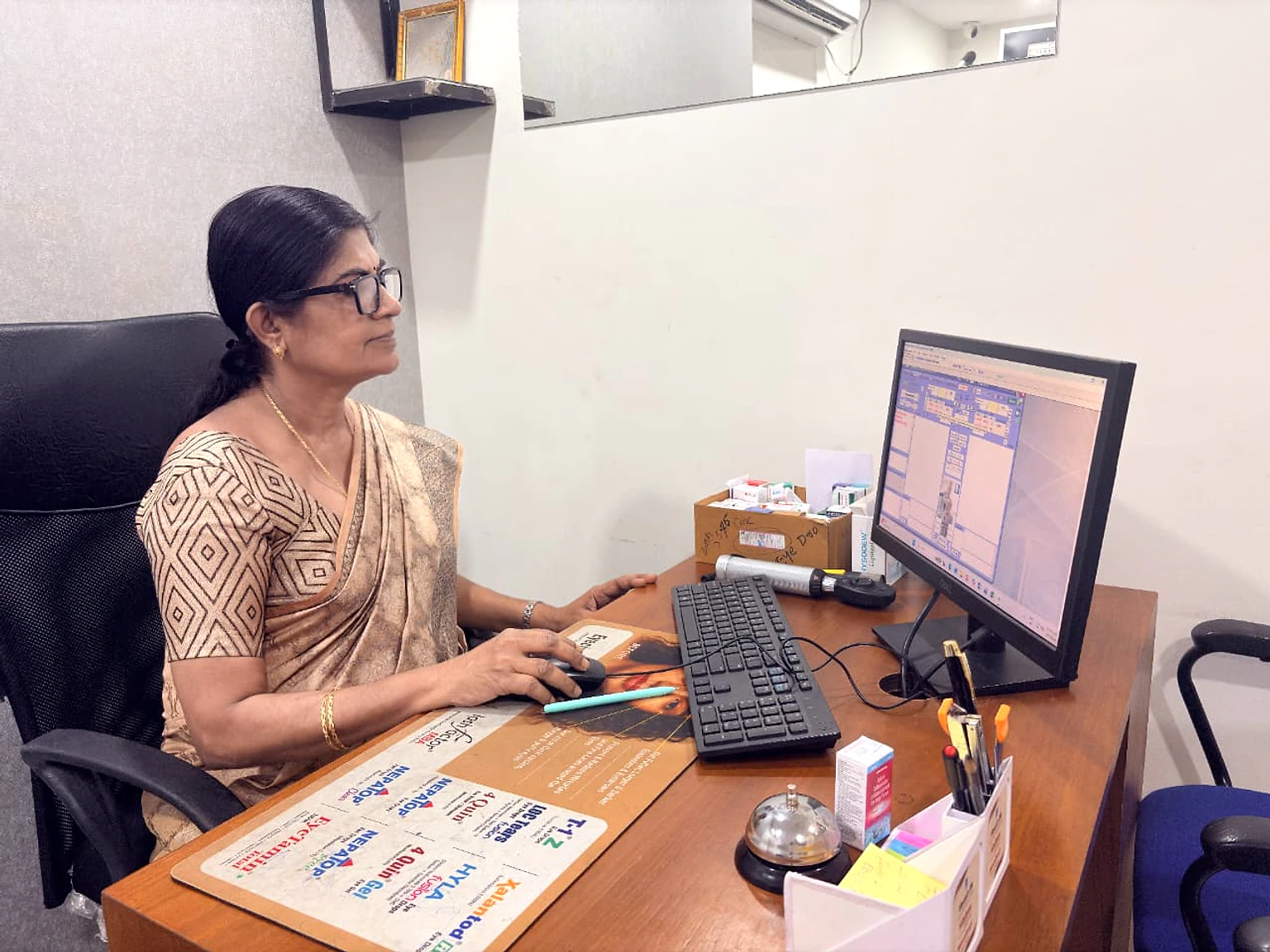 A clinician at the consultation desk