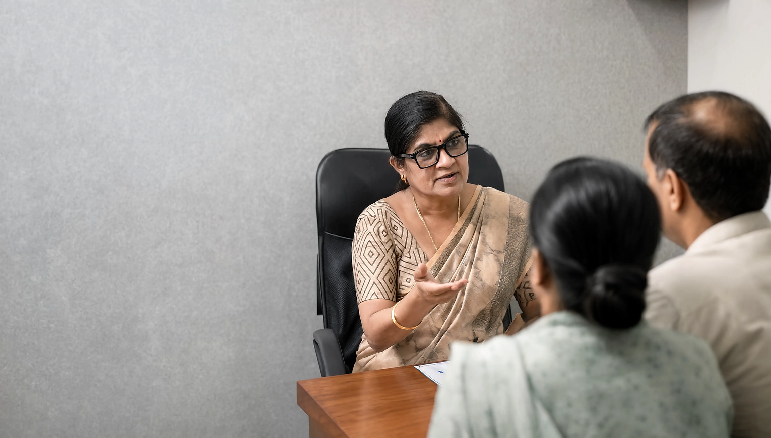 Ophthalmologist explaining an eye scan to a patient