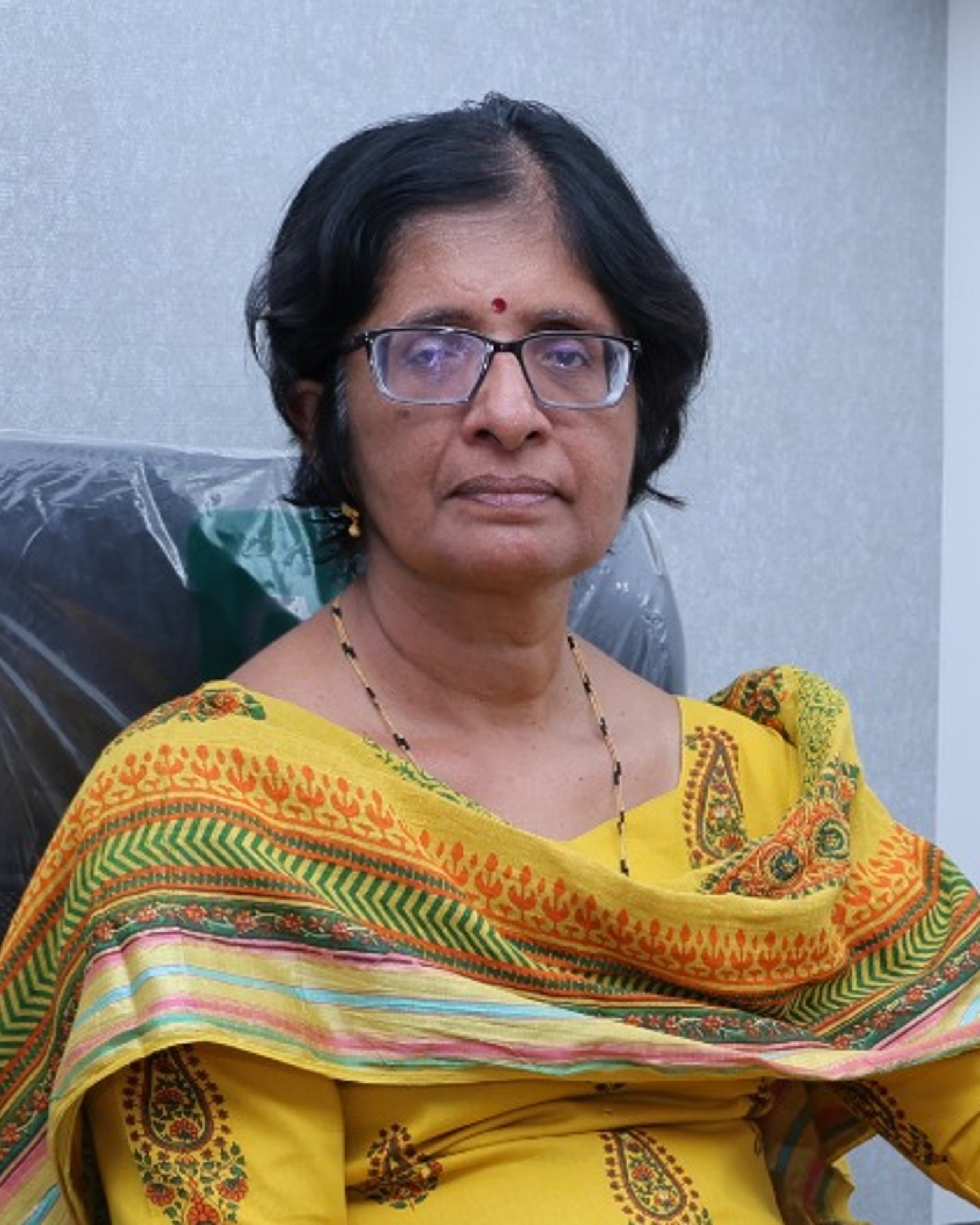 Dr. Asha Warrier