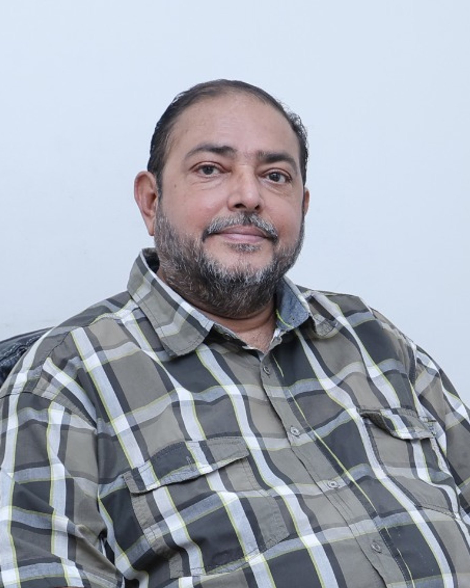 Dr. Rajiv Menon